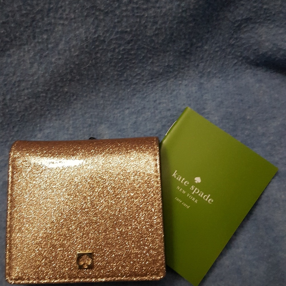 Kate Spade bi fold wallet